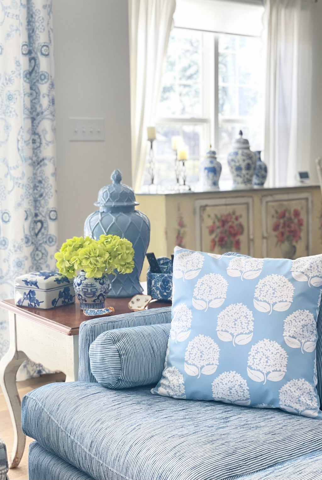 Chapple Chandler’s white hydrangeas throw pillows