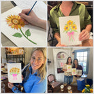 Women enjoying a beginner watercolor workshop with painting supplies